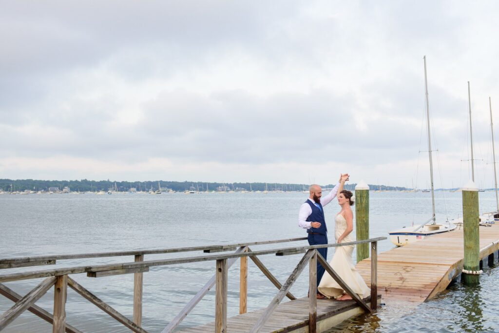 wedding couple dancing on lake