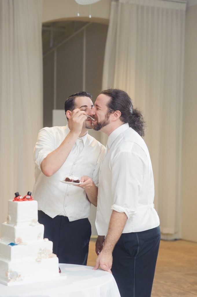 belle mer gay wedding cake cutting